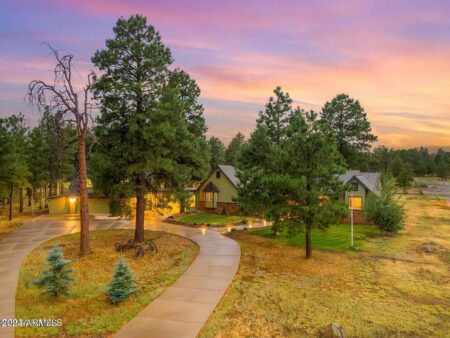 Photo of Just Closed: Stunning Forest Retreat at 10730 N Linda Lane